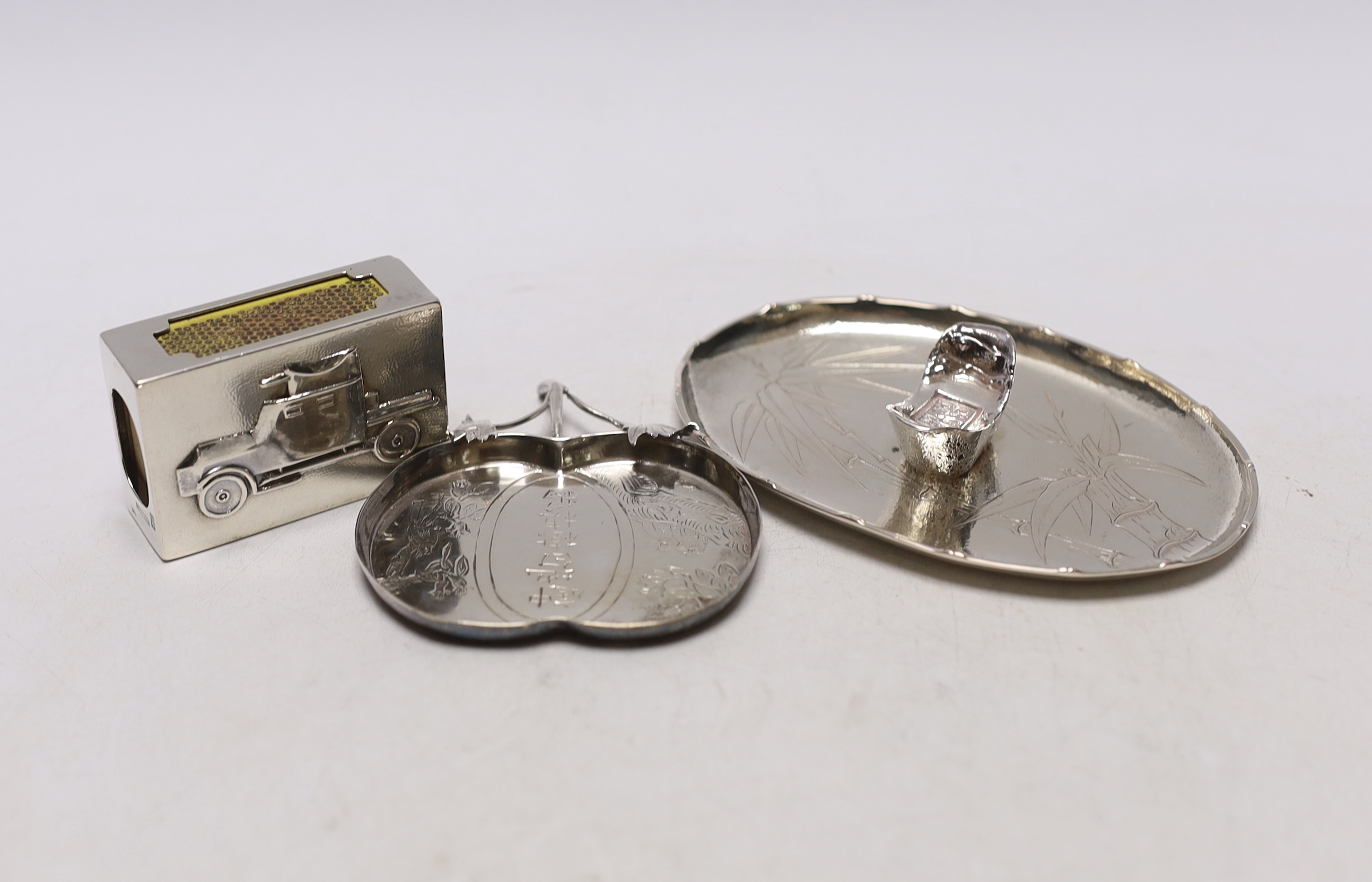 A Chinese white metal fruit shaped dish, maker, CW, 81mm, together with a sterling ingot dish and a matchbox holder, by Lang Hang.